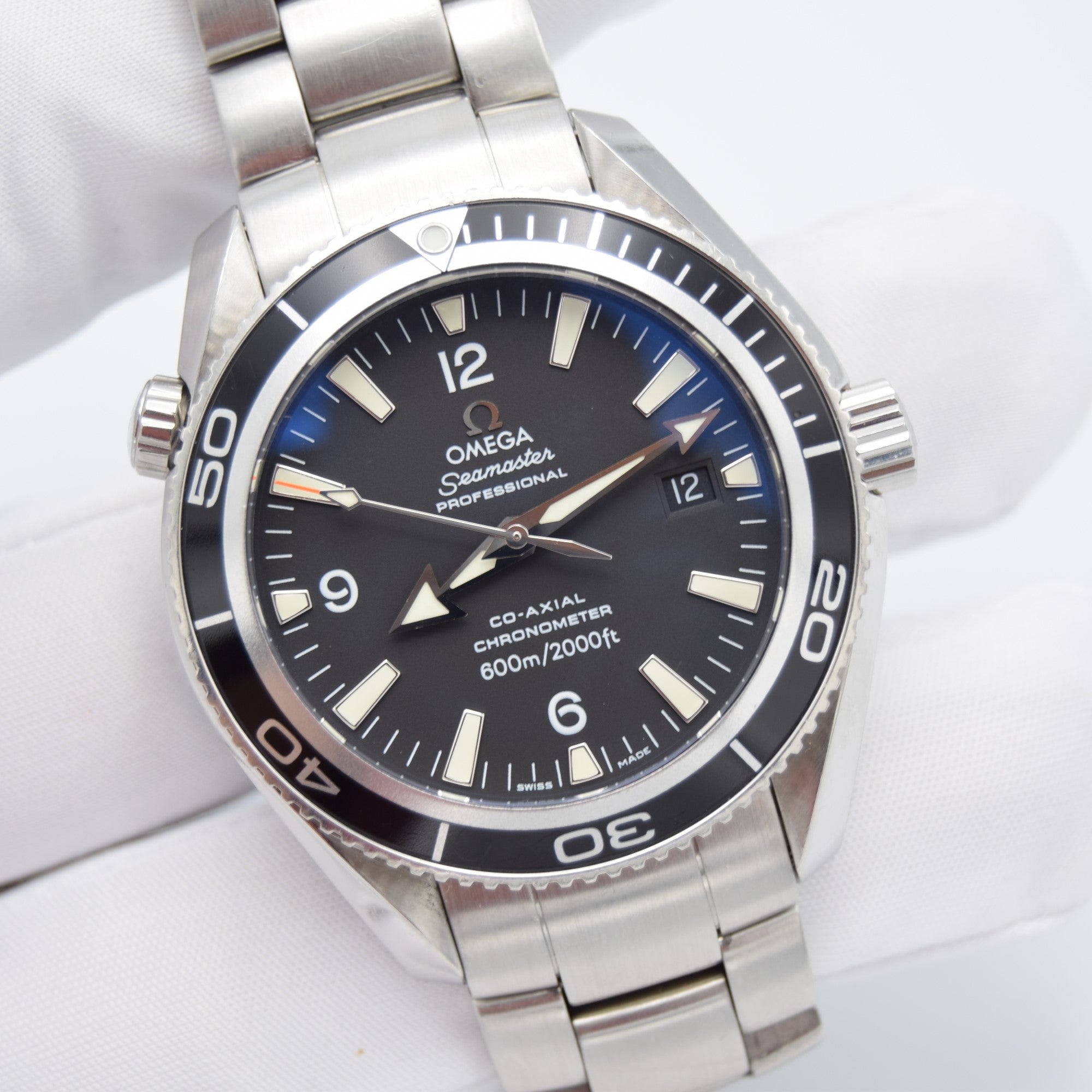 Omega seamaster professional co clearance axial chronometer 600m 2000ft price